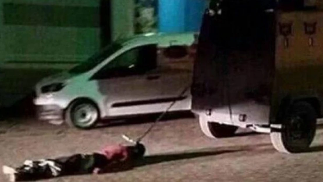 Cenaze sürüklendi, 2 polis görevden alındı