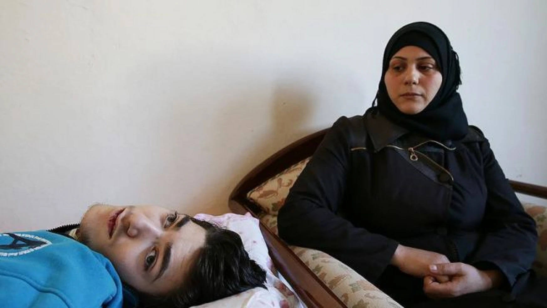 Suriyeli anne engelli çocuğu için hayata tutunuyor