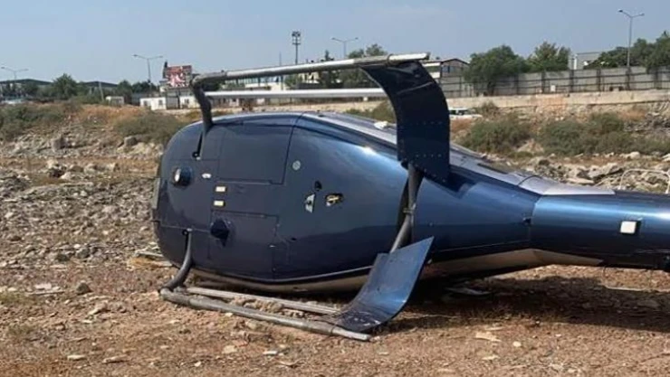 İzmir'in Çiğli ilçesinde sivil bir helikopter kalkış esnasında yan yattı. Olayda hafif yaralanan 2 kişinin tedbir amacıyla hastaneye kaldırıldığı öğrenildi.